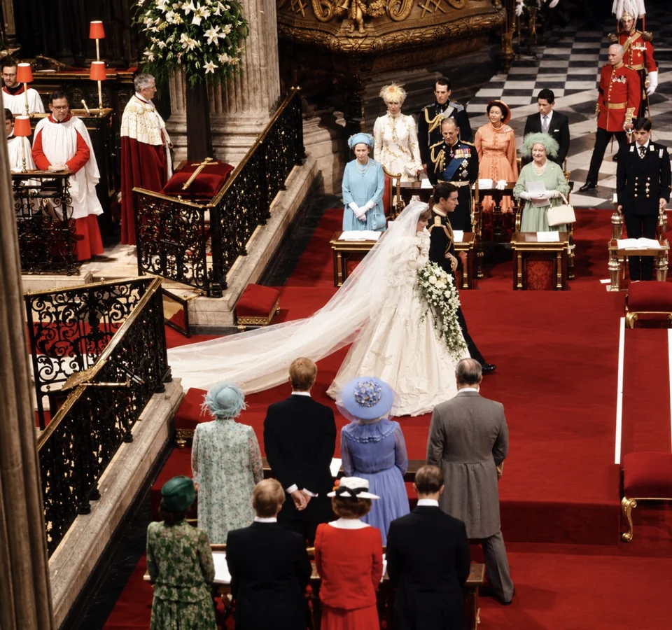 Charles and Diana during their wedding ceremony, with royal guests and ornamental screens at St Paul’s